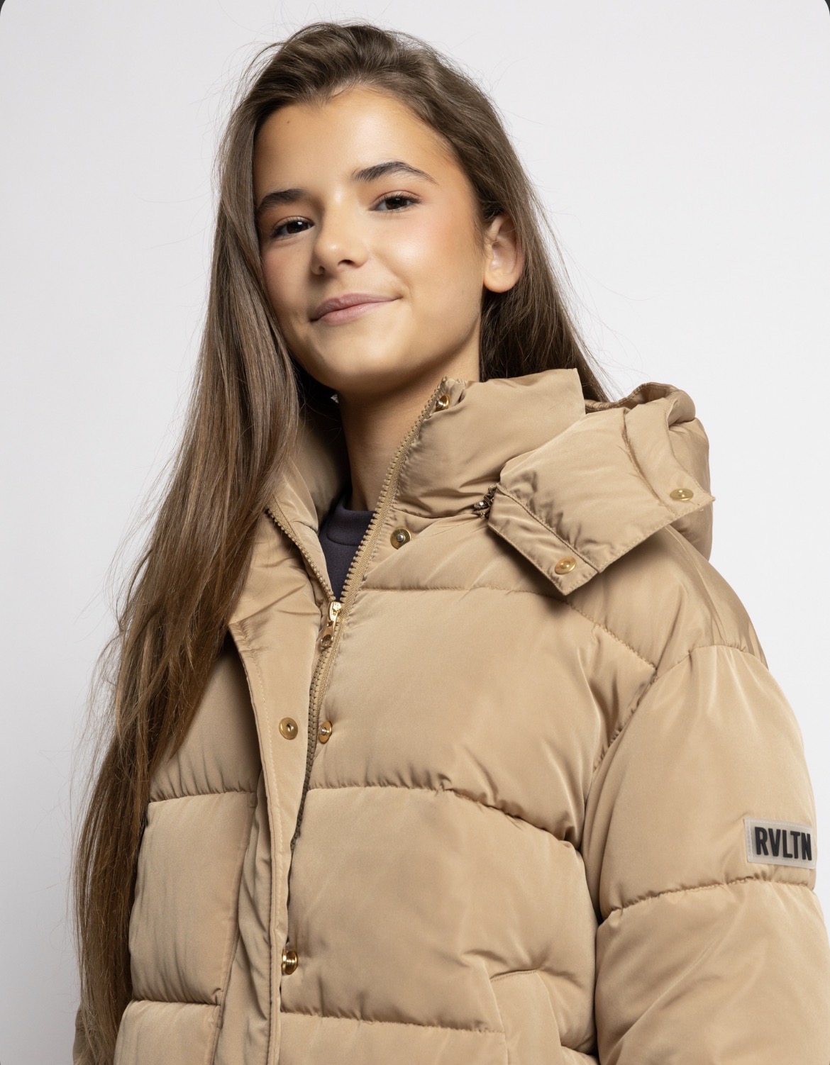 Meisje in winterjas